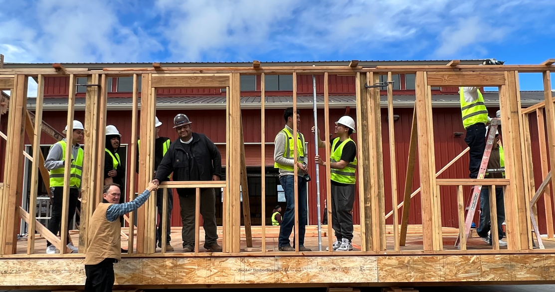 Donor Logo: Students and leaders on site